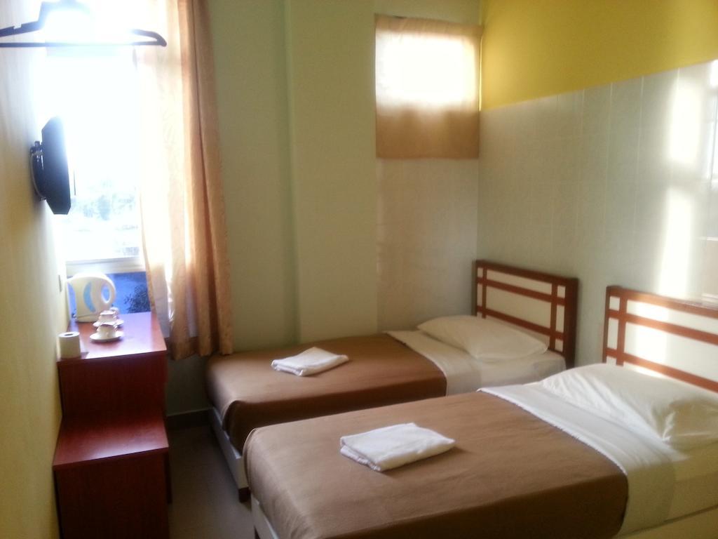 Sakiza View Hotel Мерсинг Номер фото
